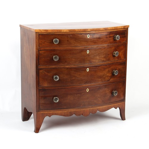 259 - Property of a gentleman - an early 19th century George III / IV mahogany bow-fronted chest of four l... 