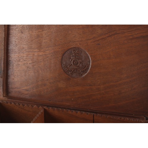 60A - Property of a gentleman - an Indian carved teak cigarette box, the interior with carved Royal Artill... 