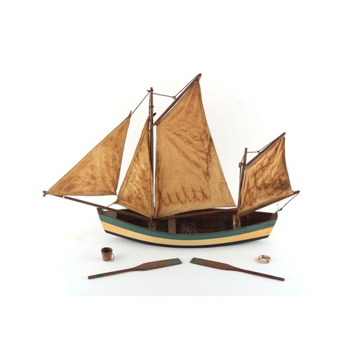 274 - Property of a gentleman - painted wood model fishing boat, complete with two oars, a folded net, a l... 