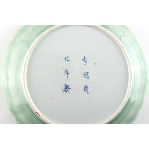 218 - Property of a lady - a set of four Japanese Arita blue and white & celadon shallow dishes, 18th / 19... 