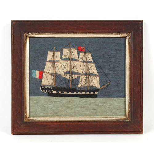 338 - Property of a gentleman - a 19th century woolwork picture depicting a three masted sailing ship flyi... 