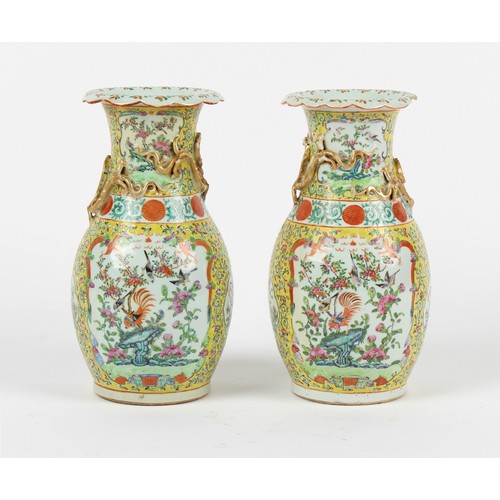 49 - Property of a lady - a pair of late 19th century Chinese Canton famille rose baluster vases with yel... 