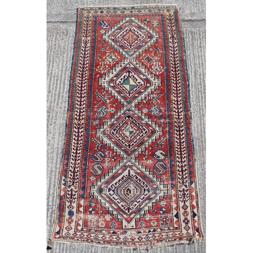 380A - Property of a gentleman - an antique Caucasian Kazak rug, 98 by 48ins. (249 by 122cms.).