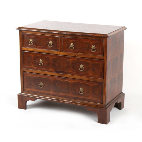 492 - Property of a gentleman - an oyster walnut veneered chest of two short & two long graduated drawers ... 