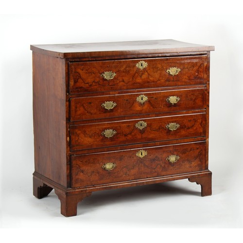 386 - Property of a deceased estate - an early 18th century figured walnut & featherbanded secretaire ches... 