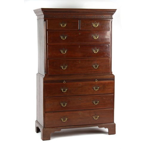 440 - Property of a lady - a George III mahogany tallboy or chest-on-chest, with brushing slide, the base ... 