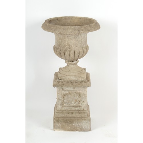 484 - Property of a deceased estate - a reconstituted stone garden urn on plinth base, 31ins. (79cms.) hig... 