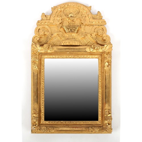 394 - Property of a lady of title - a 19th century Continental giltwood framed wall mirror with later beve... 