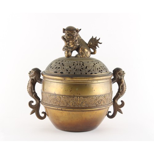 101 - A large bronze censer, 19th century, the pierced cover with temple lion finial, previously with stan... 