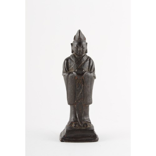 87 - Property of a deceased estate - a Chinese bronze standing figure of a scholar or priest, Ming Dynast... 