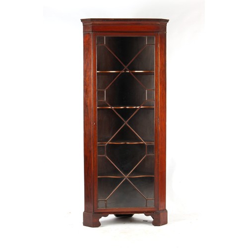 405 - Property of a gentleman - a 19th century mahogany freestanding corner display cabinet with dentil co... 