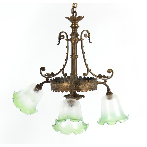 286A - Property of a gentleman - an Edwardian brass triple ceiling light, the green tinted glass lampshades... 