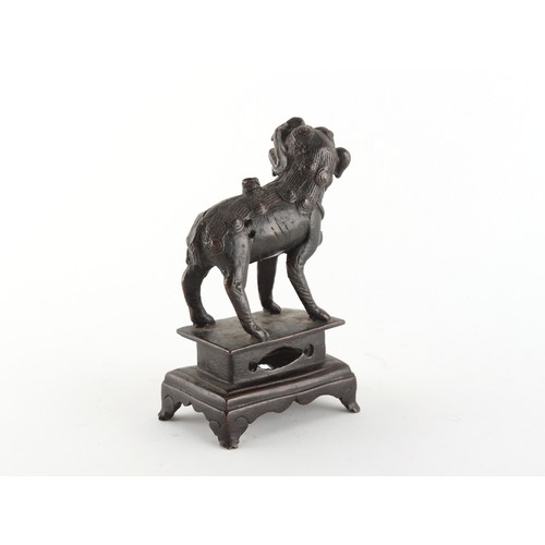 153 - Property of a gentleman - a Chinese bronze joss stick holder modelled as a lion, Ming dynasty (1368-... 