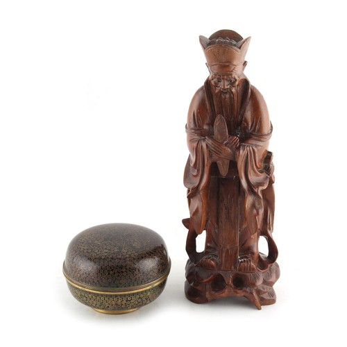 111 - An early 20th century Chinese carved rootwood figure of an Immortal or scholar, 9.45ins. (24cms.) hi... 