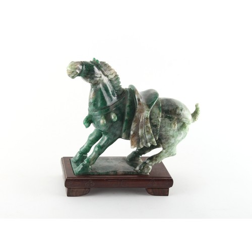 150 - Property of a gentleman - a Chinese Tang style carved nephrite jade model of a caparisoned horse, 20... 