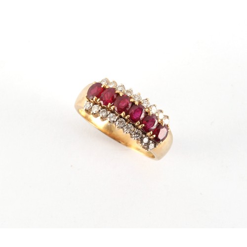 10 - An 18ct yellow gold ruby & diamond ring, set with a row of six oval cushion cut rubies weighing appr... 