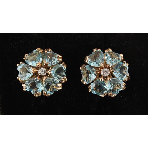 12 - A good pair of aquamarine & diamond flowerhead cluster earrings, each set with six heart shaped cut ... 