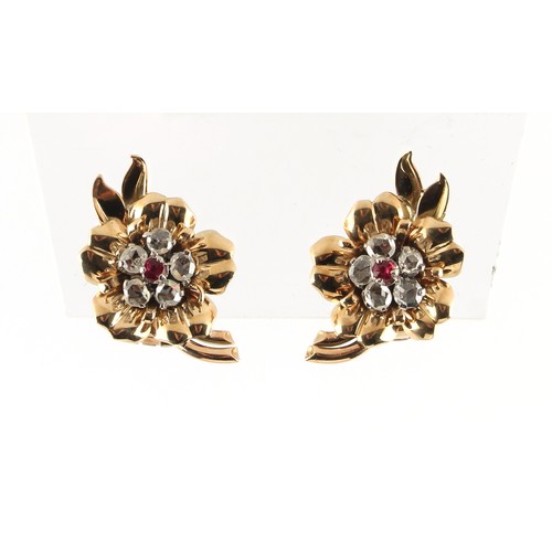 13 - A pair of unmarked yellow gold ruby & diamond earrings, of floral form, each set with five rose cut ... 