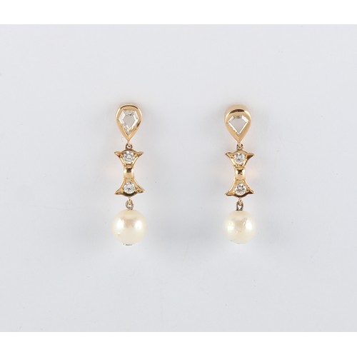 22 - A pair of 18ct yellow gold pearl & diamond earrings, the untested pearls each approximately 8mm diam... 