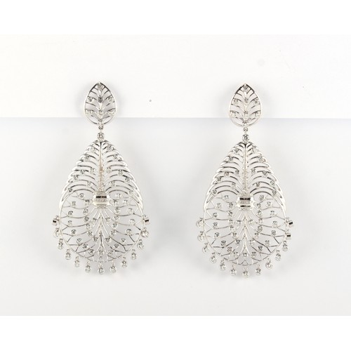 30 - A large pair of 18ct gold diamond openwork earrings, of stylised veined leaf design set with diamond... 