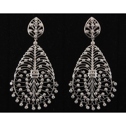 30 - A large pair of 18ct gold diamond openwork earrings, of stylised veined leaf design set with diamond... 