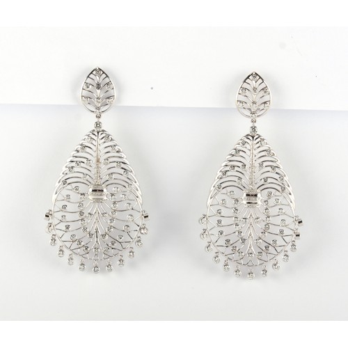 30 - A large pair of 18ct gold diamond openwork earrings, of stylised veined leaf design set with diamond... 