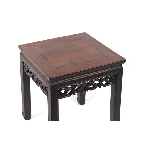 163 - A late 19th century Chinese hongmu table with carved frieze, 17.75 by 17.5ins. (45 by 44.5cms.).