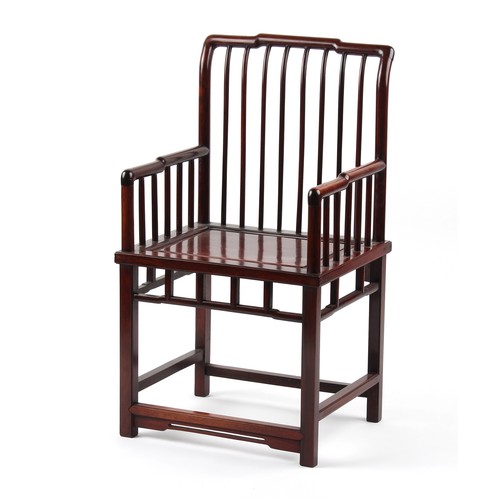 185 - A Chinese hongmu armchair, with spindle back & arm supports.