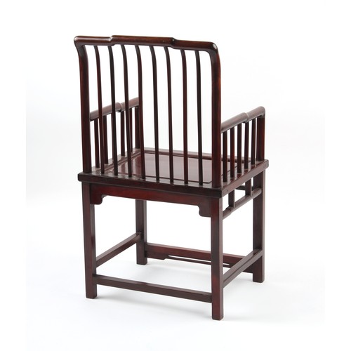 185 - A Chinese hongmu armchair, with spindle back & arm supports.