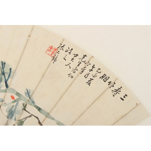 170 - A Chinese fan painting depicting flowers & rockwork, signed with calligraphy & red seal, the paintin... 