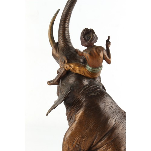 135 - Property of a lady - a Franz Bergman bronze figure of a mahout on a seated elephant, Bergman tradema... 