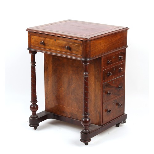 255 - Property of a gentleman - an unusual Victorian walnut davenport, with fitted interior.