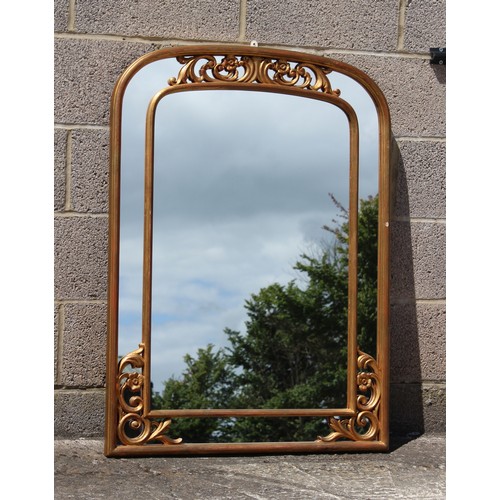 272 - Property of a gentleman - a modern gilt framed overmantel mirror, 41.35ins. (105cms.) high.