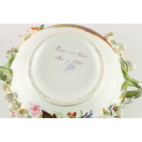 21 - A large mid 19th century Minton floral encrusted porcelain covered sugar basin, painted with a view ... 