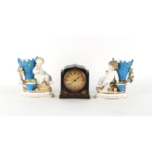 31 - Property of a gentleman - a pair of Victorian porcelain putti spill vases, probably Moore Bros., 7.1... 