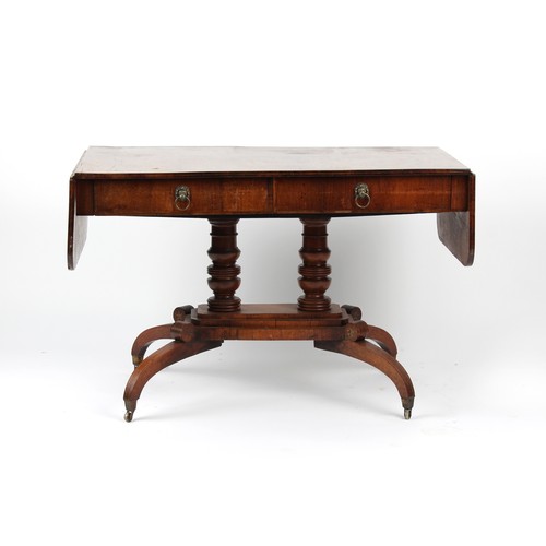 344 - Property of a gentleman - an early 19th century Regency period rosewood sofa table, with two frieze ... 