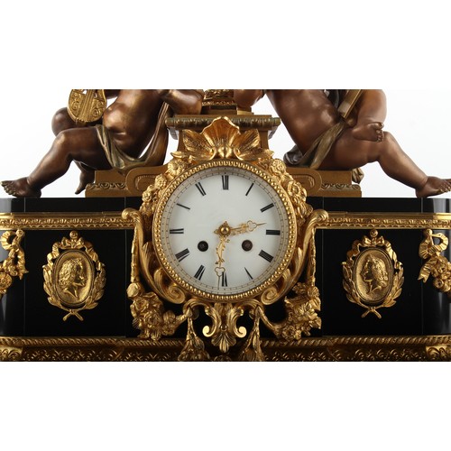 237 - Property of a gentleman - a late 19th century French bronze gilt brass & black marble cased mantel c... 