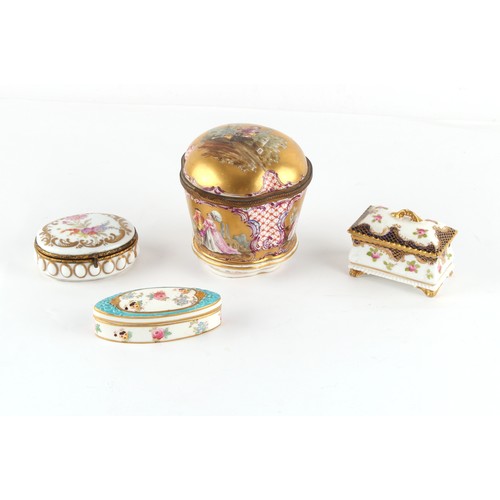 43 - Property of a lady - a group of four late 19th and early 20th century porcelain trinket boxes, the l... 