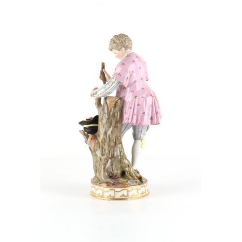 46 - Property of a gentleman - a Meissen figure of a young man collecting sticks in his hat, circa 1880, ... 