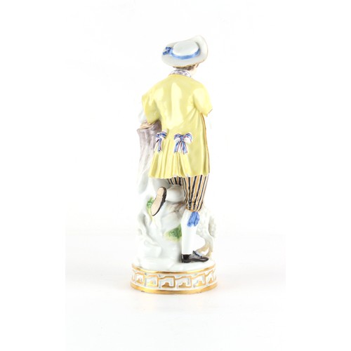 47 - Property of a gentleman - a Meissen figure of a young man holding a messenger bird with a love lette... 