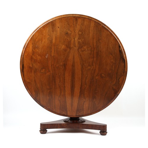 450 - Property of a gentleman - an early 19th century William IV rosewood circular tilt-top dining table, ... 