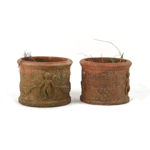 542 - Property of a gentleman - a pair of weathered terracotta garden planters with cherub decorations, ea... 