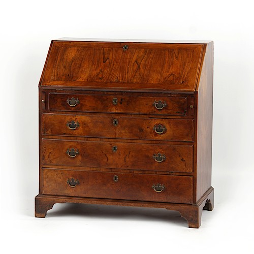 329 - Property of a lady - a mid 18th century George II walnut fall-front bureau, with fitted interior abo... 