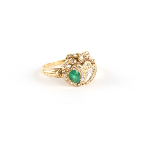 38 - Property of a deceased estate - an 18ct yellow gold emerald & diamond twin heart ring, with a cut pe... 