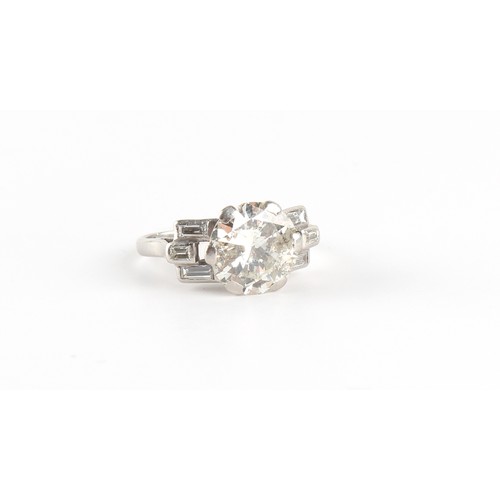 95 - Property of a lady - a platinum diamond single stone ring, the round brilliant cut diamond weighing ... 