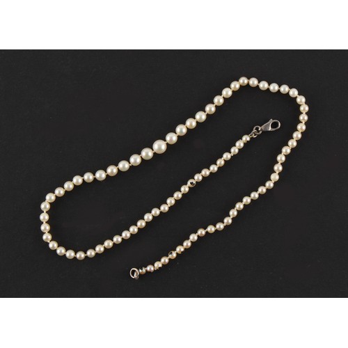 137 - Property of a lady - a certificated natural saltwater pearl single strand necklace, the 83 graduated... 