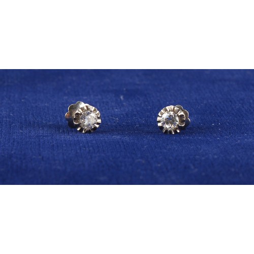 51 - Property of a lady - a pair of unmarked white gold diamond flowerhead stud earrings, with screw fast... 