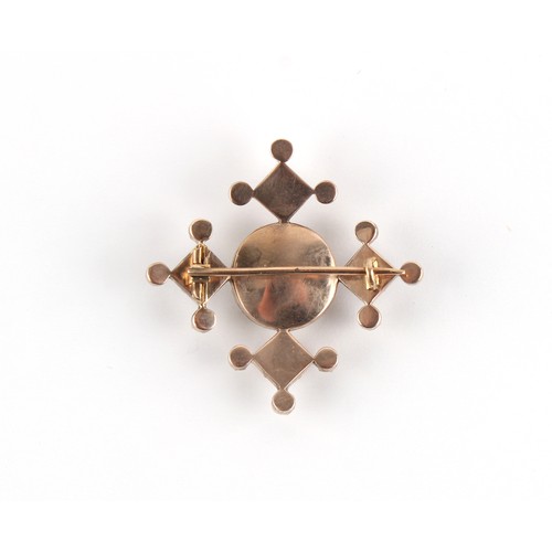 64 - A 19th century garnet & pearl cross pendant, 34mm across.