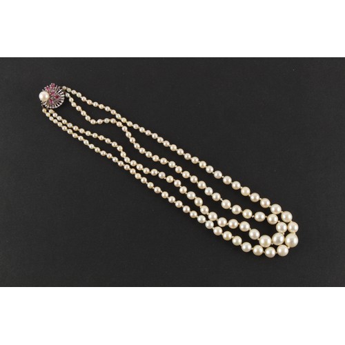 56 - A cultured pearl graduated two strand necklace, the largest pearl approximately 9.4mm, on 14ct white... 