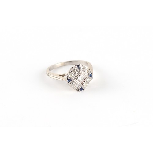 71 - A Continental Art Deco diamond & sapphire ring, the octagonal setting with centre round brilliant cu... 